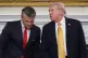 President Donald Trump talks with Defense Secretary Pete Hegseth after a roundtable on criminal cartels in the State Dining Room of the White House, October 23, 2025, in Washington