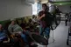 Humanitarian worker Roger Duvan Lagunes carries a fan into Cogra, an elderly shelter, in Veracruz, Mexico, on June 16, 2024
