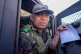 CAPSAT military unit commander Col. Michael Randrianirina and his troops make their way to the presidency to announce that the armed forces are taking control of the country in Antananarivo, Madagascar, October 14, 2025