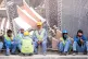 SOCIAL DISLOCATION: Migrant construction workers in the West Bay area of Doha, Qatar waiting for a bus. Pic: Alex Sergeev/CC