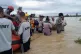 Nepalese army personnel transport survivors after a flood in Jhapa district east of Nepal, October 5, 2025. Photo: Nepal Army via AP