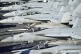 F18 jets lined up on the flight deck of the USS Gerald R. Ford, the 'world's largest warship', during a media visit while it is anchored in the Solent during a stopover in Portsmouth on it's maiden deployment. Picture date: Thursday November 17, 2022