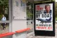 A poster on a bus stop on Baylis Road in Southwark, south London, depicting President Donald Trump that states 