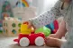 04/08/23 of a baby playing with toys at home in Northamptonshire