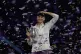 Elena Rybakina of Kazakhstan celebrates with her trophy after defeating Aryna Sabalenka of Belarus in the women's final singles match of the WTA finals in Riyadh, Saudi Arabia, Saturday, Nov. 8, 2025