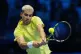 Spain's Carlos Alcaraz returns the ball to Australia's Alex de Minaur during their singles tennis match of the ATP World Tour Finals, in Turin, Italy, Sunday, Nov. 9, 2025.