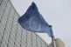 The flag of the International Atomic Energy Agency flies in front of its headquarters during an IAEA Board of Governors meeting in Vienna, Austria, on February 6, 2023