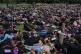 Participants lie on the ground during a gender-based violence protest at the forecourt of the botanical gardens in Johannesburg, South Africa, November 21, 2025