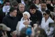 Amine Kessaci (centre) and his mother attend a gathering in homage to his brother Mehdi Kessaci at the roundabout where he was murdered, and to protest against drug trafficking, in Marseille, southern France, November 22, 2025
