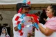 A man sells flags of Honduras and the ruling party LIBRE during the closing campaign rally of presidential candidate Rixi Moncada in San Pedro Sula, Honduras, November 22, 2025