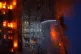 Firefighters work to extinguish a fire which broke out at Wang Fuk Court, a residential estate in the Tai Po district of Hong Kong's New Territories, November 26 2025