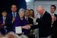 Catherine Connolly shakes hands with Chief Justice Donal O'Donnell while holding presidential seal of office during her inauguration ceremony as Ireland's 10th president in Dublin Castle, November 11, 2025