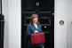 Chancellor of the Exchequer Rachel Reeves poses outside 11 Downing Street, London, with her ministerial red box, before delivering her Budget in the House of Commons, November 26, 2025