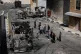 Palestinians and journalists survey damage in an industrial zone following an attack by Israeli settlers the previous day in the West Bank village of Beit Lid, near Tulkarm, November 12, 2025