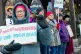 People take part in a national day of protest against US policy on Venezuela in Brattleboro, Vermont, , December 6, 2025