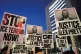 COMPASSION NEEDED: Demonstrators hold signs during a rally against federal immigration enforcement at Federal Courthouse Plaza, Minneapolis, on Tuesday January 27