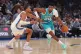 Charlotte Hornets forward Brandon Miller, right, drives past Oklahoma City Thunder guard Aaron Wiggins, left, during the second half of an NBA basketball game, January 5, 2026, in Oklahoma City