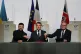Ukraine's President Volodymyr Zelenskyy (left) France's President Emmanuel Macron and Britain's Prime Minister Keir Starmer shake hands after the signing of the declaration on deploying post-ceasefire force in Ukraine, January 6, 2025