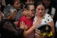 Ramona Palma, center, mother of Venezuelan soldier Cesar Garcia, mourns during his funeral in Caracas, Venezuela, Wednesday, Jan. 7, 2026. Garcia was killed in the U.S. raid that captured Venezuelan President Nicolas Maduro