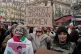 Protesters march with placards during a rally in support of the nationwide mass demonstrations in Iran against the government in Paris, January 11, 2026