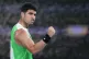 Carlos Alcaraz of Spain celebrates after defeating Adam Walton of Australia in their first round match at the Australian Open tennis championship in Melbourne, Australia, January 18, 2026