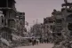 Palestinians walk along a street surrounded by buildings destroyed during Israeli air and ground operations in Khan Younis, southern Gaza Strip, January 22, 2026