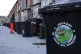 A sticker supporting the strikes on a bin as agency refuse workers collect rubbish in the Saltley area of Birmingham, January 6, 2026