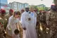 Guinea's President, Gen. Mamadi Doumbouya, arrives with his wife, Lauriane Doumbouya, to cast their votes in the presidential election in Conakry, Guinea, December 28, 2025