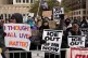 Pro-immigration protesters rally in front of Minneapolis City Hall, January 17, 2026, in Minneapolis