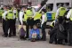 Police remove protesters taking part in a demonstration organised by Defend our Juries, in support of Palestine Action in Trafalgar Square, London, October 4, 2025