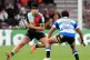 Harlequins' Marcus Smith (left) tries to pass DHL Stormers' Imad Khan (right) during the Investec Champions Cup match at Twickenham Stoop, London, January 11, 2026