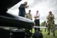 WARFARE NOT WELFARE: Defence Secretary John Healey, in a red tie, at the Warminster Garrison, Wiltshire, after £5 billion investment in innovative capabilities, including drones and Directed Energy Weapons is announced, June 2025 
