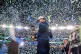 Seahawks head coach Mike Macdonald looks at the Lombardi trophy as confetti rains down after the Seahawks won over the New England Patriots in the NFL Super Bowl 60 game, in Santa Clara, California, February 8, 2026