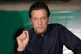 Pakistan's former Prime Minister Imran Khan gives a press conference at his home, in Lahore, Pakistan, on May 18, 2023