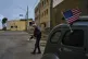 A man walks between American and Cuban flags in Havana, February 1, 2026