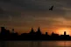 A view of the River Mersey and the city skyline, with the Royal Liver Building at centre, as the sun rises over Liverpool, October 2017