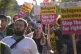 People take part in the Stand Up To Racism rally near the TLK Apartments and Hotel in Orpington, August 22, 2025
