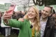 Green Party leader Zack Polanski with the Green Party Gorton and Denton by-election candidate Hannah Spencer taking a selfie with Green Party volunteers at Granada Park in Denton, February 7, 2026