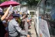Released prisoners, in a bus, are welcomed by family members and colleagues after they left Insein Prison, in Yangon, Myanmar, March 2, 2026