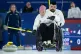 Britain's Jo Butterfield releases a stone as teammate Jason Kean looks on during the match against Italy in the Wheelchair Curling Mixed Doubles at the 2026 Winter Paralympics, in Cortina d'Ampezzo, Italy, March 7, 2026
