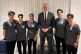 Minister Tony Burke (centre) poses in an undisclosed location with five Iranian women soccer players who have been granted asylum in Australia, March 10, 2026. Photo: Australia Ministry of Home Affairs via AP