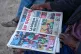 People read newspapers reporting on the Confederation of African Football decision stripping the Senegal national football team of their Africa Cup of Nations title and awarding it to Morocco national football team in Dakar, Senegal, March 18, 2026
