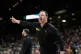 Siena head coach Gerry McNamara gestures to the players during the first half in the first round of the NCAA college basketball tournament against Duke, March 19, 2026, in Greenville, S.C.