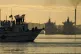 Activists wave Cuban and Palestinian flags from the vessel Maguro, arriving from Mexico with humanitarian aid as part of the 