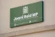 Signage at the constituency office of Joani Reid at Jacobean House in East Kilbride