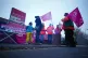 Members of the Communication Workers Union (CWU) on the picket line outside the Royal Mail Bristol South East delivery office in Bristol, December 14, 2022