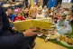  School children listen to a story about brushing teeth inside a classroom at Fair Furlong Primary School in Bristol, March 6, 2025