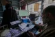 A Muslim woman checks her census registration online at a registration center in Srinagar, Indian controlled Kashmir, April 1, 2026