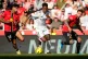 Real Madrid's Vinicius Junior in action betweem Mallorca's Samu Costa, left, and Pablo Maffeo during a La Liga soccer match between Mallorca and Real Madrid in Palma de Mallorca, Spain, April 4, 2026