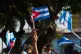 Women wave Cuban flags during a rally calling for the end of the U.S. blockade against the island nation in Havana, Cuba, April 7, 2026